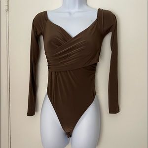 Brown body suit